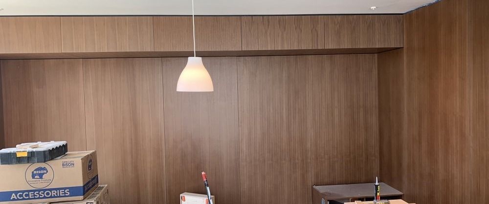 Santa Monica remodel — primary bedroom with paneling being installed, under construction